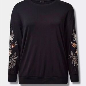 Torrid Black Sweatshirt with Elegant Floral Details